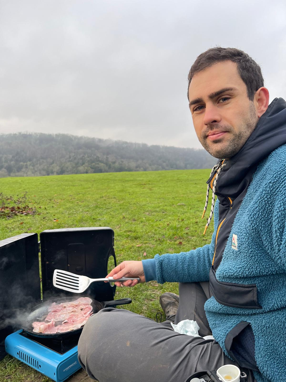 Steve Henderson cooking bacon