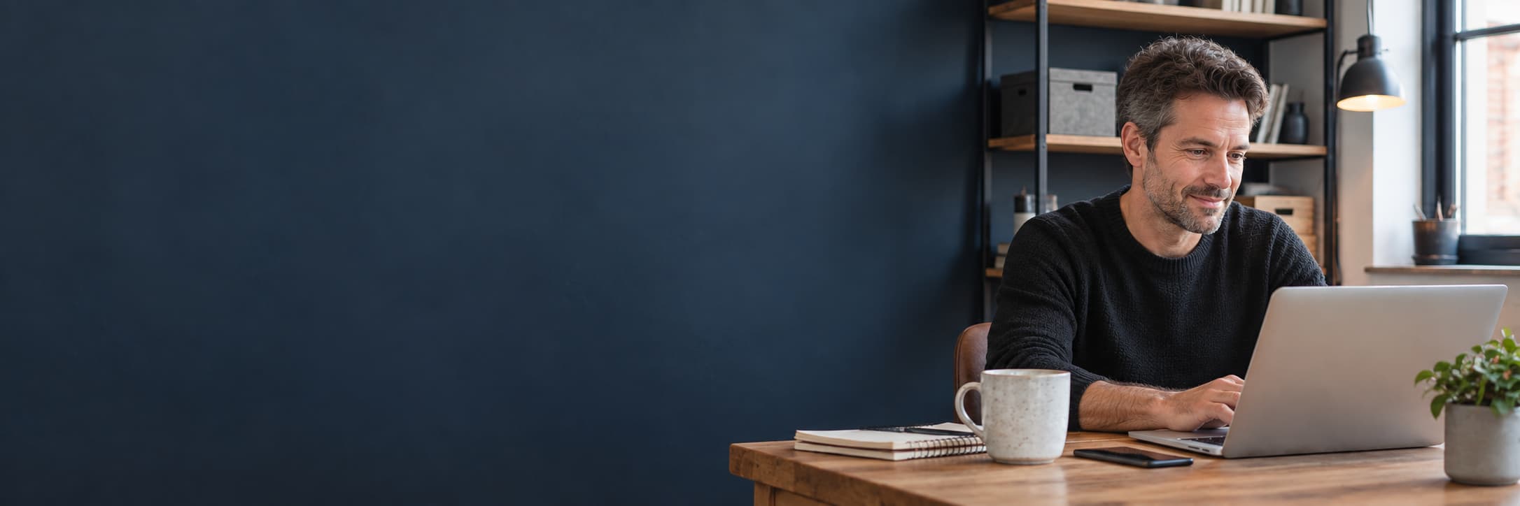 small business owner at a laptop