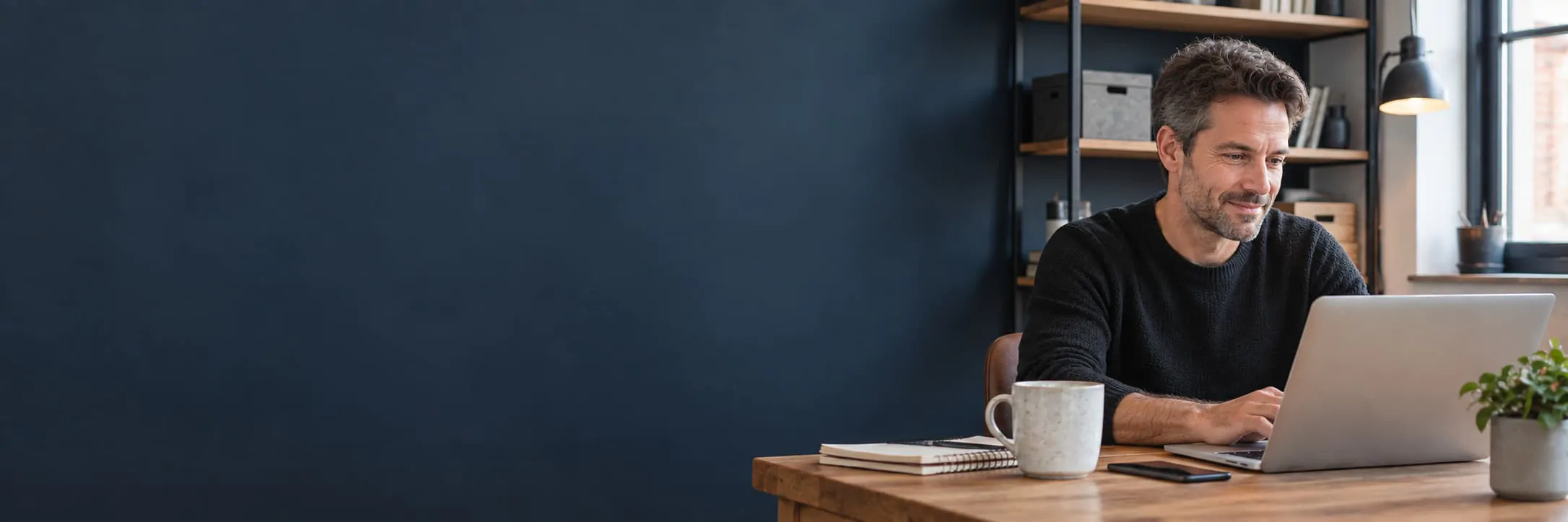 small business owner at a laptop